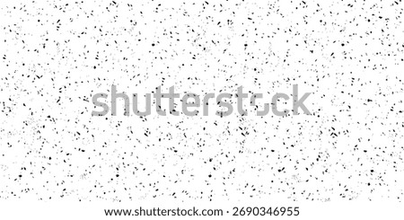 A seamless abstract texture of scattered black speckles or confetti on a clean white background