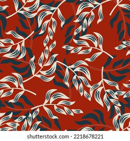 Seamless abstract tropical background with leaves.