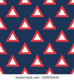 Seamless abstract vector geometric pattern. Red and white triangles on dark blue background. Symmetrical layout. Gift wrapping paper. Bed sheets and interior.