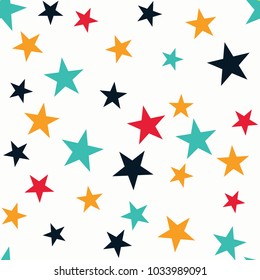 Seamless abstract vector geometric pattern. Yellow, red, light blue and dark blue star shapes on white background. Random layout. Gift wrapping paper. Bed sheets and interior.