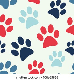 Seamless abstract vector geometric pattern. Red, light blue and dark blue paw prints on white background. Random layout. Gift wrapping paper. Bed sheets and interior.