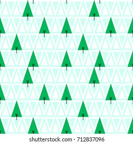 Seamless abstract vector geometric pattern. Light and dark green triangle shaped trees ornament. Random layout. Gift wrapping paper. Bed sheets and interior. Nature theme.