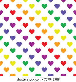 Seamless abstract vector geometric pattern. Ornament made of rainbow colored hearts on white background. LGBT flag colors. Symmetrical layout. Gift wrapping paper. Bed sheets and interior.