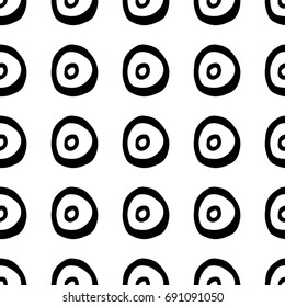 Seamless abstract vector monochrome geometric pattern. Black hand drawn double circles put symmetrically on white background. Gift wrapping paper. Bed sheets and interior.
