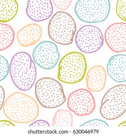 Seamless abstract vector pattern with freehand drawn cartoon circles and dots made in different colors on white background
