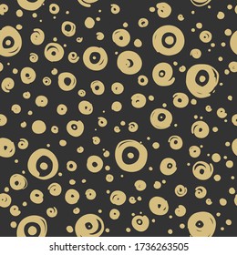 Seamless abstract vector pattern of ink dots and circles. Doodle style, hand drawing, organics, circles, spots, trending style for textiles, backgrounds, wallpapers, ceramics and design.