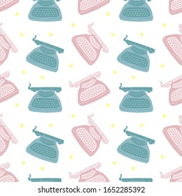 Seamless abstract vector pattern. Pink andblue typewriters and yellow hearts isolated on white background. World writer's day colorful illustration. Perfect for wallpaper or fabric.