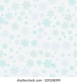 Seamless abstract winter background with snowflakes. Christmas background. Vector.