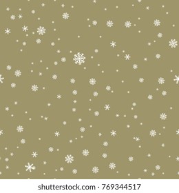 Seamless abstract winter pattern with snowflakes on gold background.