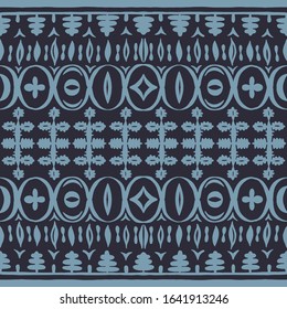 Seamless African pattern. Ethnic carpet with chevrons. Tribal vector ornament. Aztec style. Geometric mosaic on the tile, majolica. Ancient interior. Modern rug. Geo print on textile. Kente Cloth.