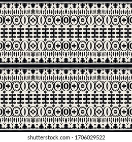 Seamless African pattern. Ethnic carpet with chevrons. Tribal vector ornament. Aztec style. Geometric mosaic on the tile, majolica. Ancient interior. Modern rug. Geo print on textile. Kente Cloth.