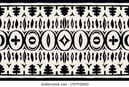 Seamless African pattern. Ethnic carpet with chevrons. Tribal vector ornament. Aztec style. Geometric mosaic on the tile, majolica. Ancient interior. Modern rug. Geo print on textile. Kente Cloth.