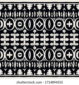 Seamless African pattern. Ethnic carpet with chevrons. Tribal vector ornament. Aztec style. Geometric mosaic on the tile, majolica. Ancient interior. Modern rug. Geo print on textile. Kente Cloth.