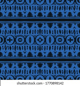 Seamless African pattern. Ethnic carpet with chevrons. Tribal vector ornament. Aztec style. Geometric mosaic on the tile, majolica. Ancient interior. Modern rug. Geo print on textile. Kente Cloth.