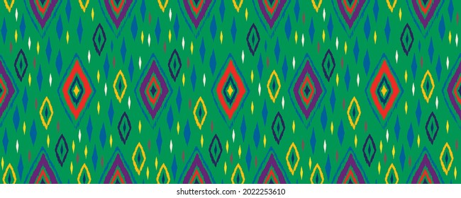 Seamless African pattern. Ethnic carpet with chevrons. Tribal vector ornament. Aztec style. Geometric mosaic on the tile, majolica. Ancient interior. Modern rug. Geo print on textile. Kente Cloth.
