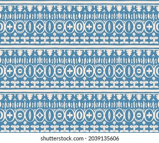 Seamless African pattern. Ethnic carpet with chevrons. Tribal vector ornament. Aztec style. Geometric mosaic on the tile, majolica. Ancient interior. Modern rug. Geo print on textile. Kente Cloth.