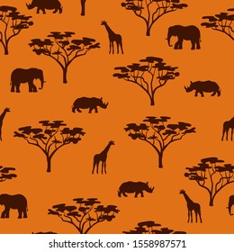 Seamless African savannah pattern with silhouettes of wild animals.