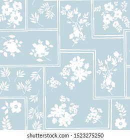 seamless all over flowers pattern on blue background