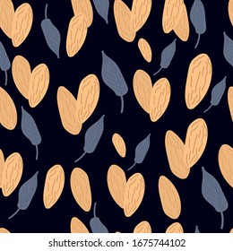 Seamless almond nut background. Delicious almonds on a dark background.