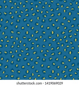 Seamless animal leopard print pattern modern hand drawn blue and yellow background