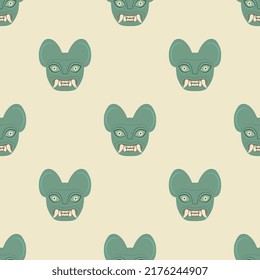 Seamless animal pattern with heads of jaguar demon. Moche art from ancient Peru. Native American art of Peruvian Indians. Green faces of cat with fangs on white background.