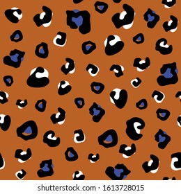 Seamless animal pattern with leopard dots . Creative animal texture for fabric, wrapping, textile, wallpaper, apparel. Vector illustration