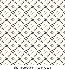 Seamless animal pattern of paw footprint and bone. Endless texture can be used for printing onto fabric, web page background and paper or invitation. Dog style. White and black colors.