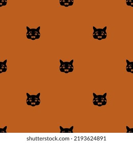 
Nahtloses Tiermuster mit stilisierten Katzengesichtern. Halloween-Design. Schwarze Silhouetten auf orangefarbenem Hintergrund.