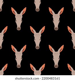 Seamless animal pattern with stylized heads of an Aardvark. Orycteropus afer. Animal masks. Cartoon style. On black background.