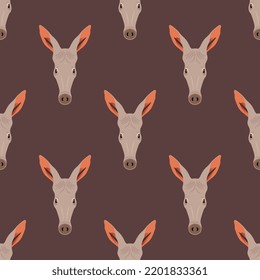 Seamless animal pattern with stylized heads of an Aardvark. Orycteropus afer. Animal masks. Cartoon style. On brown background.