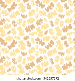 The seamless animal pattern with yellow and brown spots