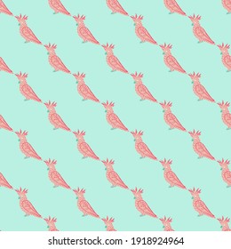 Seamless animal tropic pattern with pink colored cockatoo parrot silhouettes. Blue pastel background. Flat vector print for textile, fabric, giftwrap, wallpapers. Endless illustration.