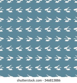 Seamless animal vector pattern, background with rabbits, grey silhouette over blue backdrop.