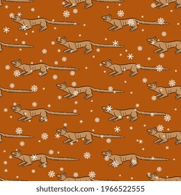 Seamless animal winter pattern with funny animals and snowflakes. Fox, squirrel or dog. Medieval illuminated manuscript style. On orange background.