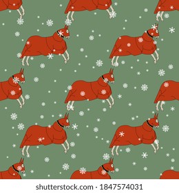 Seamless animal winter pattern with running medieval horses in tournament coats under snowflakes.