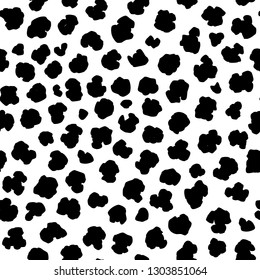 Seamless animalistic pattern, leopard or dalmatian skin, spotted pattern