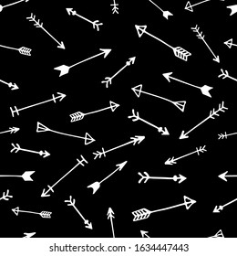 Seamless arrow pattern design in vector. Hand drawn abstract pattern repeated in black and white colors. Scandinavian trend. Monochromatic seamless background with arrows.