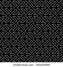 Seamless arrows pattern. Repeated arrowhead shapes background. Squama ornament. Scales image. Ancient window tracery motif. Ethnic embroidery wallpaper. Digital paper for textile print. Vector art.