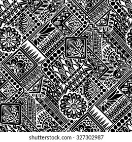 Seamless asian ethnic floral retro doodle black and white background pattern in vector. Henna paisley mehndi doodles design tribal black and white pattern.