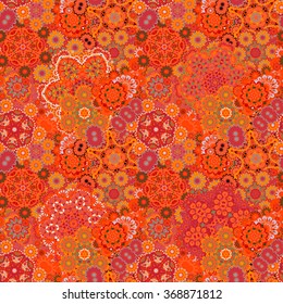 Seamless asian ethnic floral retro doodle orange background pattern in vector. Henna paisley mehndi doodles design tribal pattern.