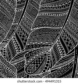 Seamless asian ethnic floral retro doodle black and white background pattern in vector. Paisley doodles design tribal pattern. Zentangle feathers.