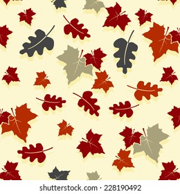 Seamless autumn background with oak and maple leaves. Vector illustration