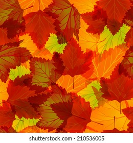 Seamless autumn background with red, yellow and brown leaves