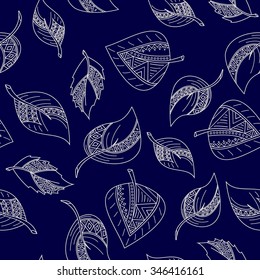 Seamless autumn leaves pattern. Decorative ornaments. Beige outline on midnight background.