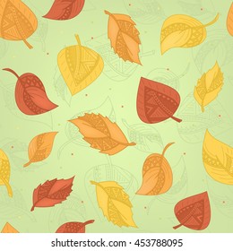 Seamless autumn leaves pattern with decorative ornament elements. Green, yellow, red on light green background.