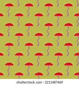 Nahtlose Herbstpilzmuster. Roter giftiger Pilz auf grünem Hintergrund. Halloween Umhüllung und Geschenkpapier. Für weibliche und männliche Textilien. Für Kinderbekleidung.