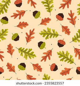Seamless autumn pattern with acorns and oak leaves. Vector graphics.