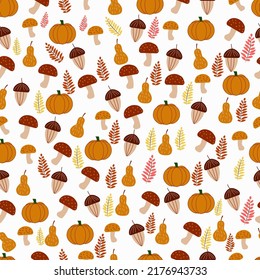 seamless autumn pattern in cartoon style for textiles or packaging with mushrooms pumpkins leaves