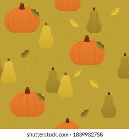 Seamless autumn pattern with colorful pumpkins on the grass. Seamless fall pattern in autumn colors.