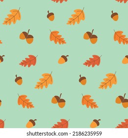 Seamless autumn pattern with falling oak leaves and acorns. Colorful vector art design. Abstract nature background.